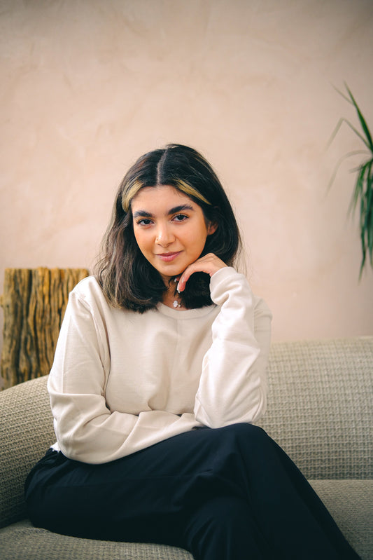 A girl wearing Loom & Sprout brand organic cotton.
