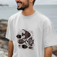 A man wearing a white t-shirt with a fish print, showcasing the Tribal Waters Men's Oversized T-Shirt style.
