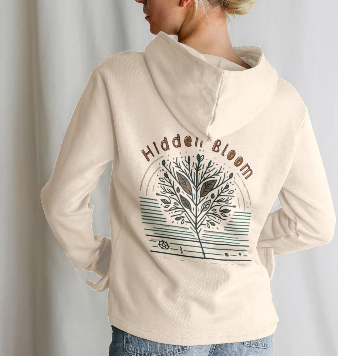 Back view of a women's relaxed fit hoodie featuring the text "hidden bloom" in a stylish font.