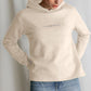 Women's stronger than ever relaxed fit hoodie in soft cotton blend, designed for comfort and casual wear.